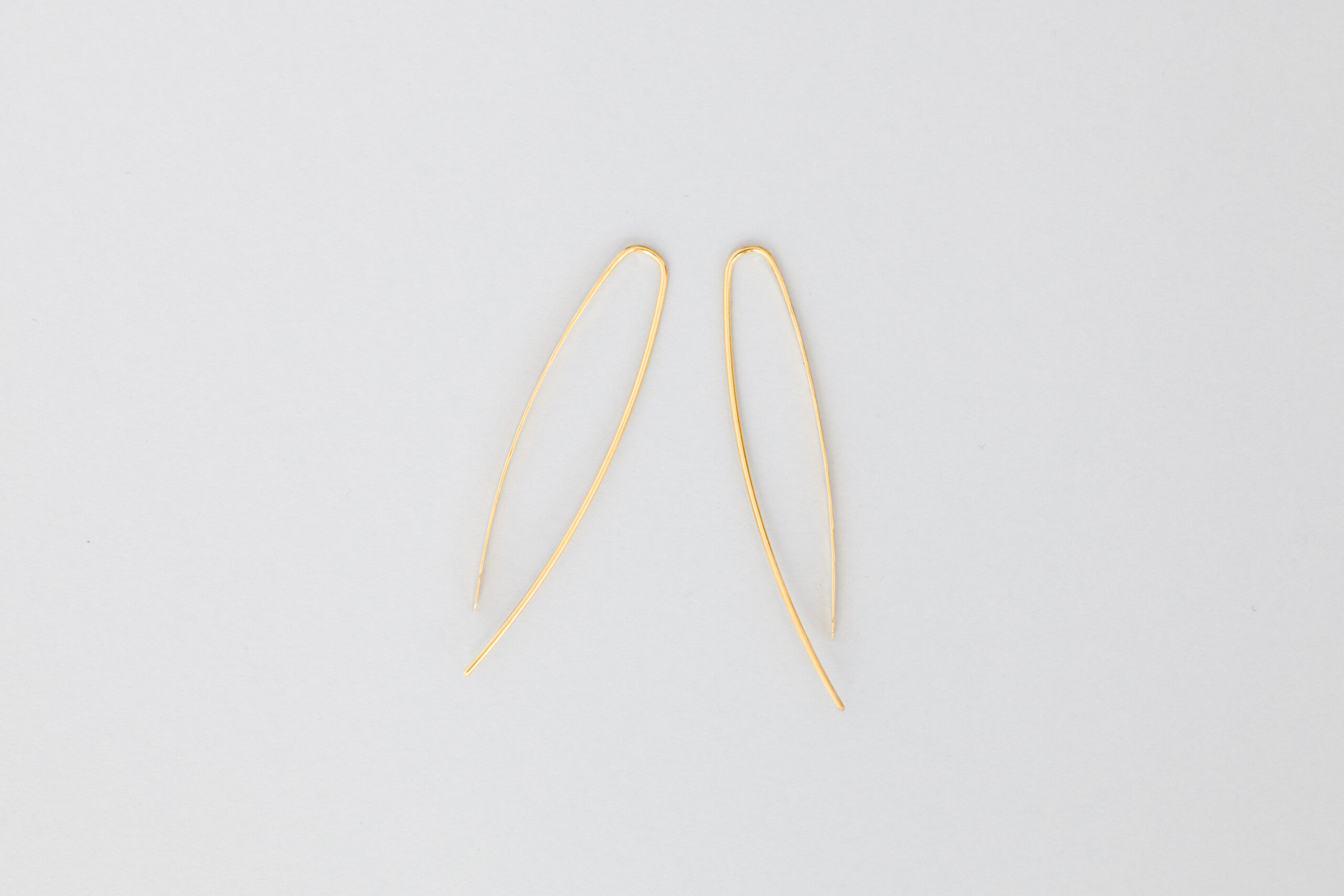 pendientes AGUA largos dorados